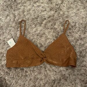 Tan bra top. Adjustable straps. Tags on never worn